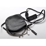 Jimmy Choo: black leather handbag, with white metal chain link decoration, pale leather to interior,