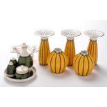 Behscherzer: a five-piece garniture, comprising: three elongated vases with pierced rims,