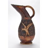H.B. Wanless: a stylised stoneware jug, with sea bird decoration, 28.5cms (11 3/4in.) high.
