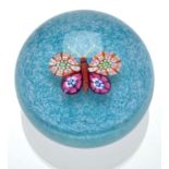 Paul Ysart (Harland): a paperweight, with millefiori butterfly to centre, on blue powder ground,