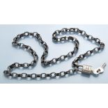 Chanel: chain and padlock belt, patinated steel, 49cms (19 1/4in.) fully extended.