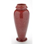 Bretby: a red flambé vase, of ovoid form with shaped rim, stamped "Bretby, Made In England 1290E",