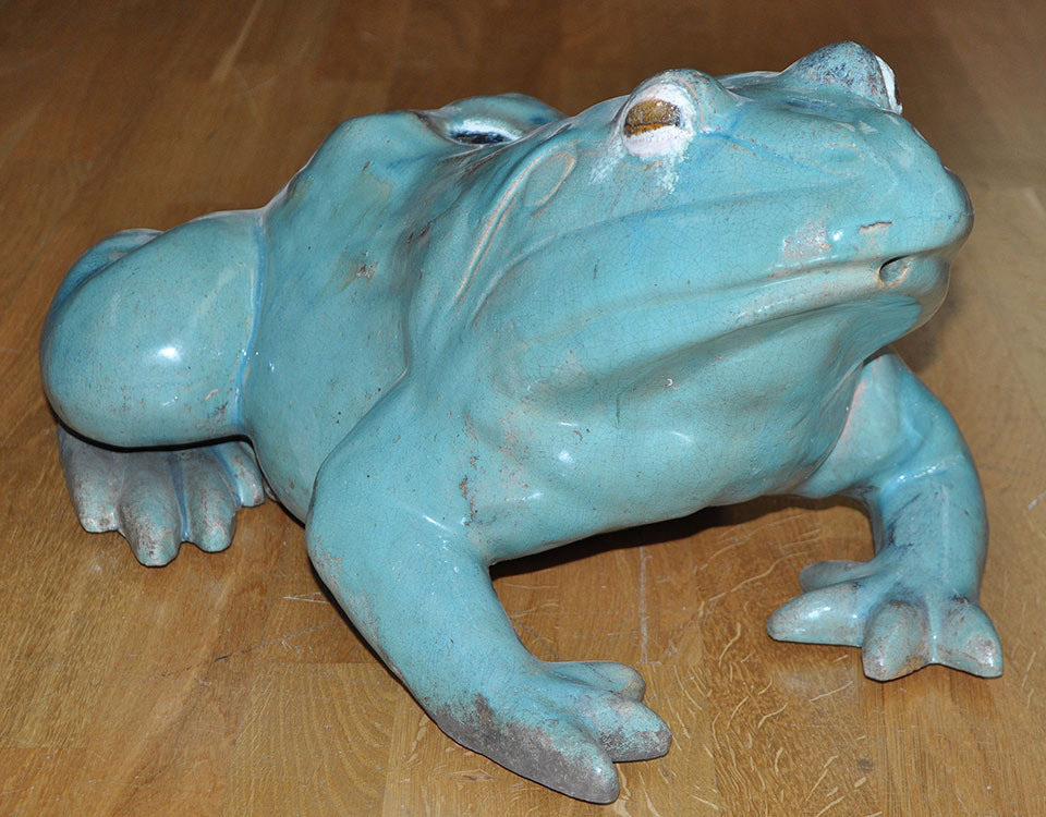 A large pottery frog garden ornament, with turquoise glaze, 51cms (20in.) length.