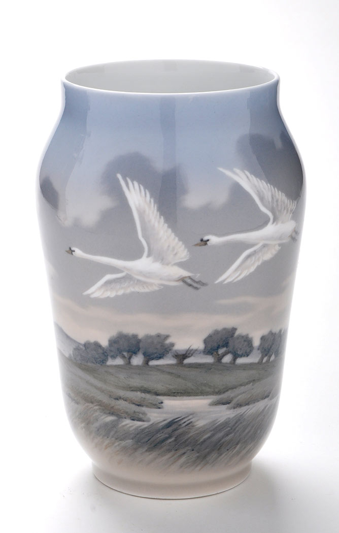 Royal Copenhagen: swans in flight vase, of cylindrical form, signed FCX, model no. 1955/1217, 25.