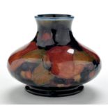 William Moorcroft: a small 'Pomegranate' bulbous vase, impressed factory mark 'Moorcroft,