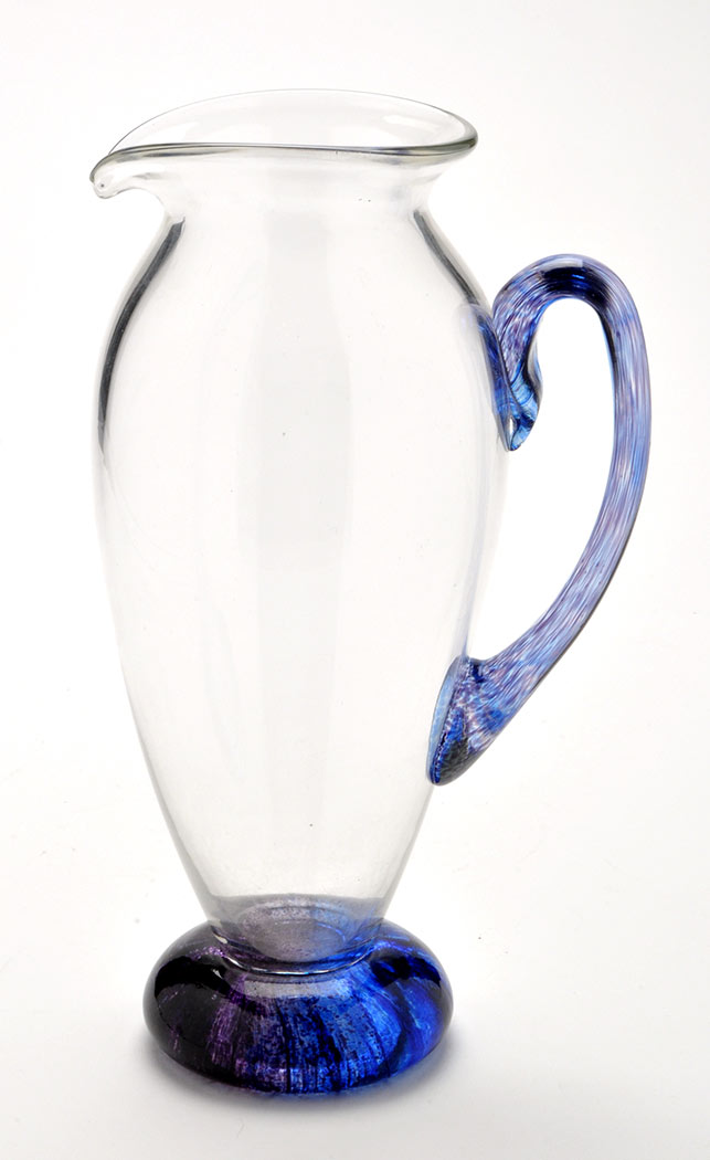 Robin Smith & Geoff Walker: a classical style glass ewer, with iridescent purple handle and base,