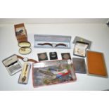 A quantity of costume jewellery; cufflinks; commemorative coins; watches; a steel cigarette box;