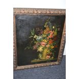 An oil painting - still-life study of flowers on a shelf, by E. Jay, signed.