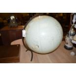 An Hammond's International terrestrial globe on wrought iron stand.