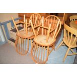 One Ercol and three similar kitchen chairs with spindle backs,
