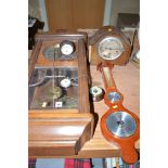 A late 20th Century wall clock in stained wood case; a mantel clock in oak case; a small barometer;