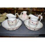 A pair of early 20th Century Solian ware water jugs with floral banded decoration;