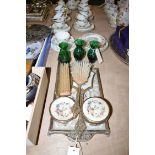 A petit point dressing table set; three green glass vases; a Mintons tea cup,