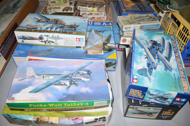 A collection of unmade model aircraft kits, by Revell; Monogram; Tamiya; Hasegawa; Airfix; etc.