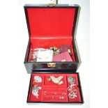 A larger quantity of costume jewellery in a jewellery box.