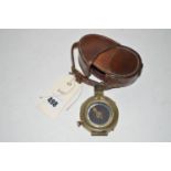 A WW1 hand held compass, stamped on the back no. 92689 1917, with leather case.
