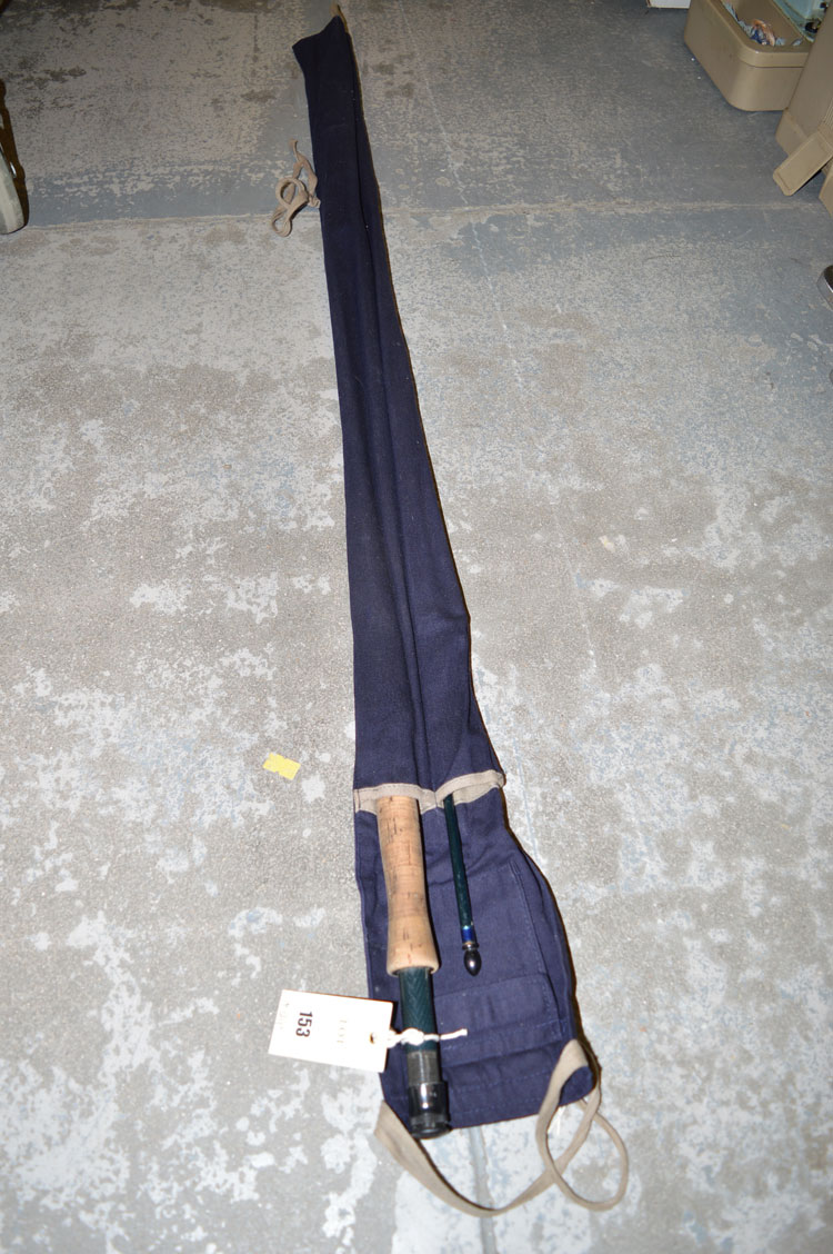 Hardy Of Alnwick: A 9ft. graphite three-piece 'Elite' #5 fishing rod in blue House Of Hardy slip.