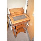 A Victorian inlaid walnut Davenport, the back fitted stationery box above a hinged writing slope,