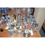 A collection of modern pewter and other metalware, including: a Piquot ware part tea service.