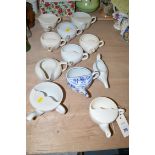 A collection of eleven ware child feeders, various.