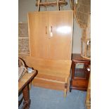 A light stained oak gentleman's wardrobe,