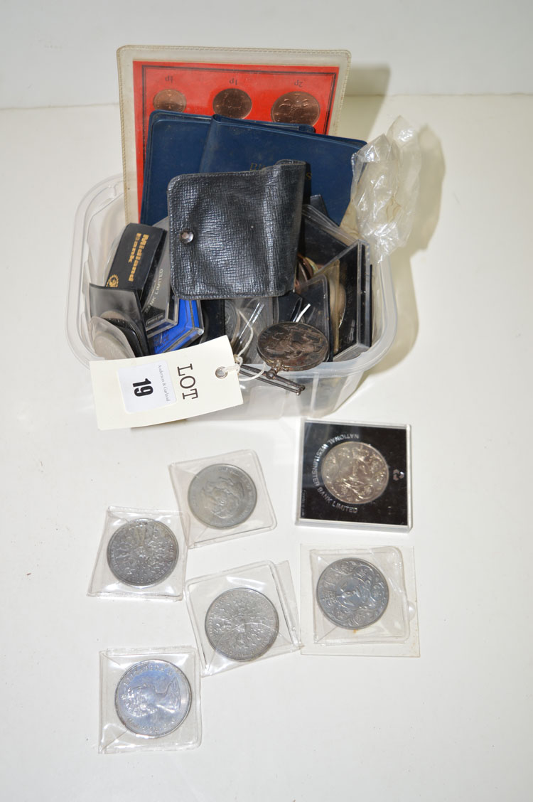 A large quantity of commemorative coins and crowns;