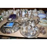 A four-piece oval EPNS tea service; a circular EPNS tray;