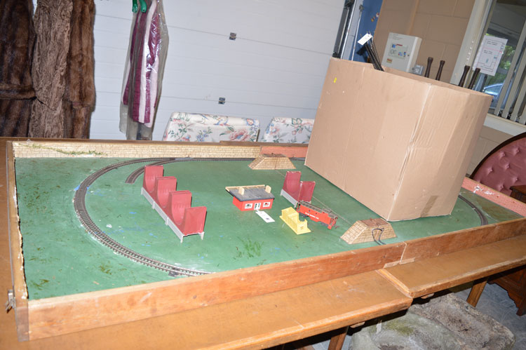 A model railway board; together with model railway engines, track and accessories.