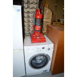 A Bosch Maxx 9 front loading washing machine; a Hoover Hurricane 1800W upright vacuum cleaner;