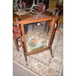 An early 20th Century Victorian rosewood firescreen,