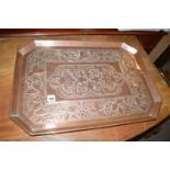 A late 19th Century rectangular copper tray with canted corners,