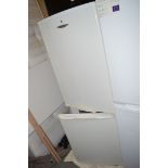 A Baumatic upright fridge freezer.