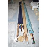 A collection of three fishing rods, comprising: a Greys 9 1/2ft.