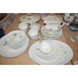 Royal Doulton 'Tumbling Leaves' part tea and dinner service, comprising: a pair of tureens, plates,