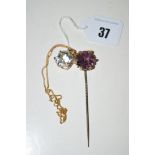 A rock crystal set pendant in yellow metal mount, on chain; together with an amethyst tie pin.