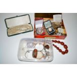 A large quantity of costume jewellery; a carved shell cameo brooch; a faux amber bead necklace;