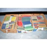 A collection of old books, various subjects, in three boxes.