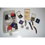 A small quantity of costume jewellery; silver; metal medallions; watches; and sundries.