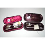 Two fork and spoon sets, in fitted cases, one by Harry Atkins,