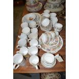 A Paragon 'Country Rose' pattern part tea set; and a collection of commemorative ware tankards;