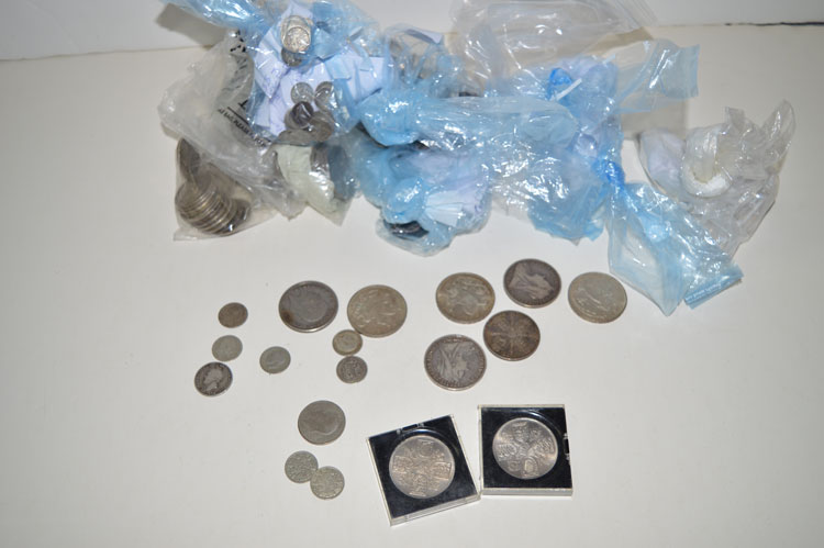 A large quantity of antique and 20th Century coinage, to include: a Charles II silver shilling,