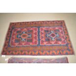 A Beluch rug with jewel medallion field, 55 x 34in.