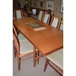 Vanson: a Danish teak extending dining table,