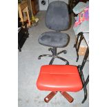 A swivel desk chair; and a leather covered stool.