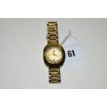 A lady's Rado Dia-Star wristwatch, with diamond set dial and date aperture,