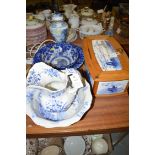 A 19th Century blue and white Delft ware rectangular box with wooden trim and hinged cover (damaged