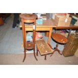 A mahogany plant stand; and inlaid two-handled tray; a wine table; and a small low table.