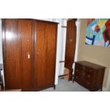 A five-piece Stag bedroom suite, comprising: a wardrobe, dressing table, stool,