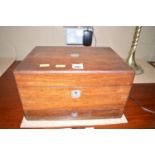 A 19th Century rosewood dressing box with fitted interior.