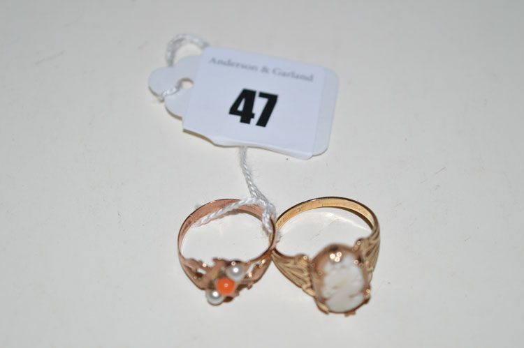 A coral and cultured pearl ring; together with a carved shell cameo ring.